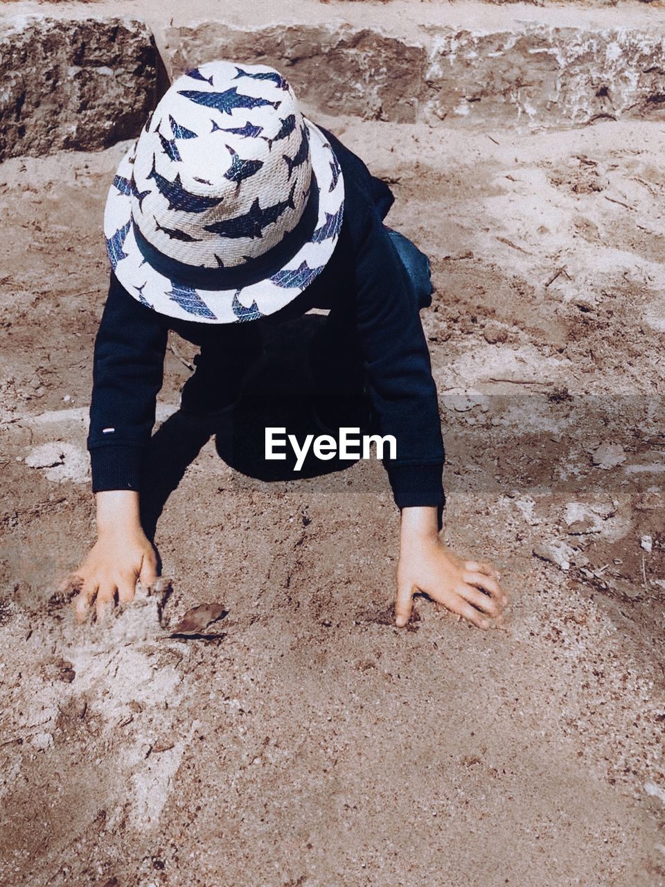 High angle view of man standing on beach