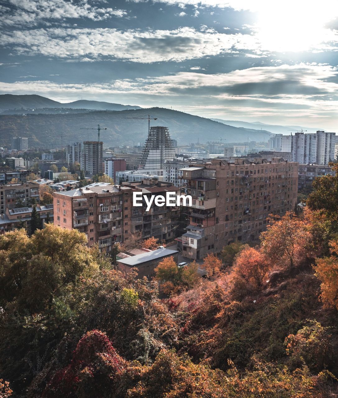 High angle view of buildings in city against sky