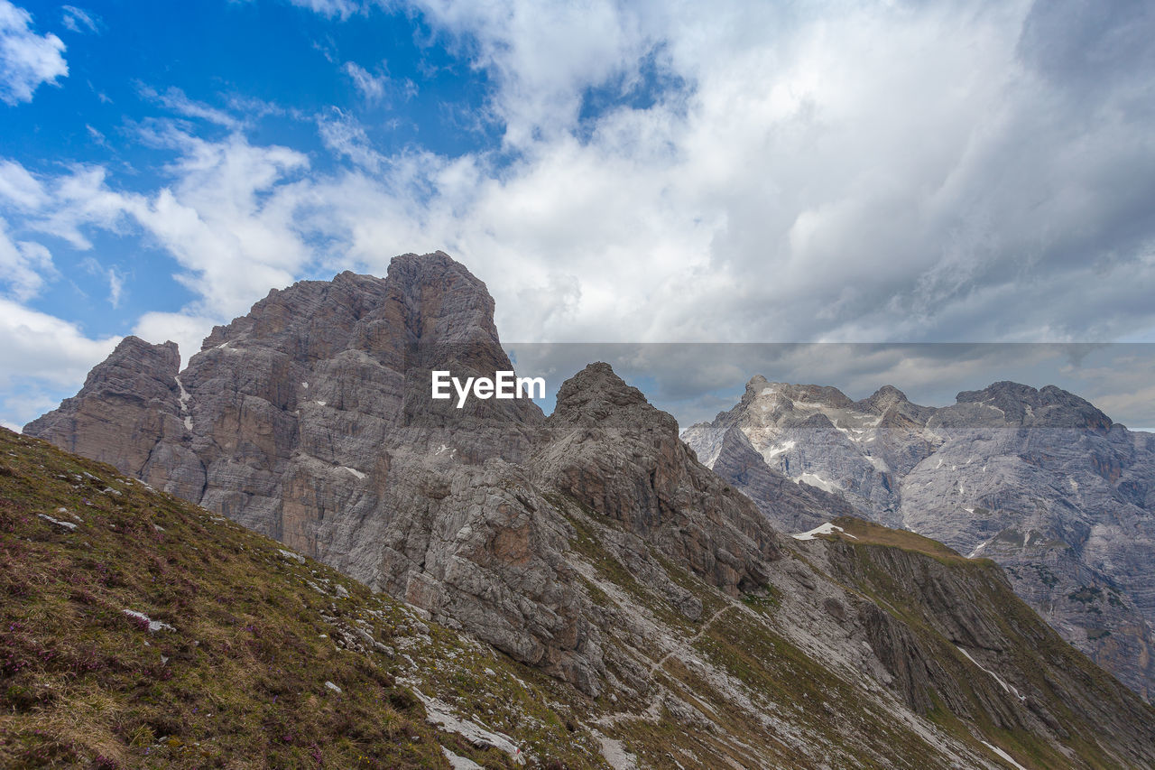 Panorama of mount duranno southern face and the cima dei preti mountain range, dolomites, italy