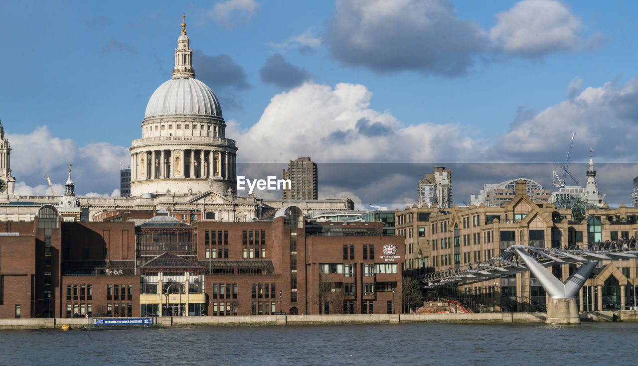 PANORAMIC VIEW OF BUILDINGS AGAINST SKY