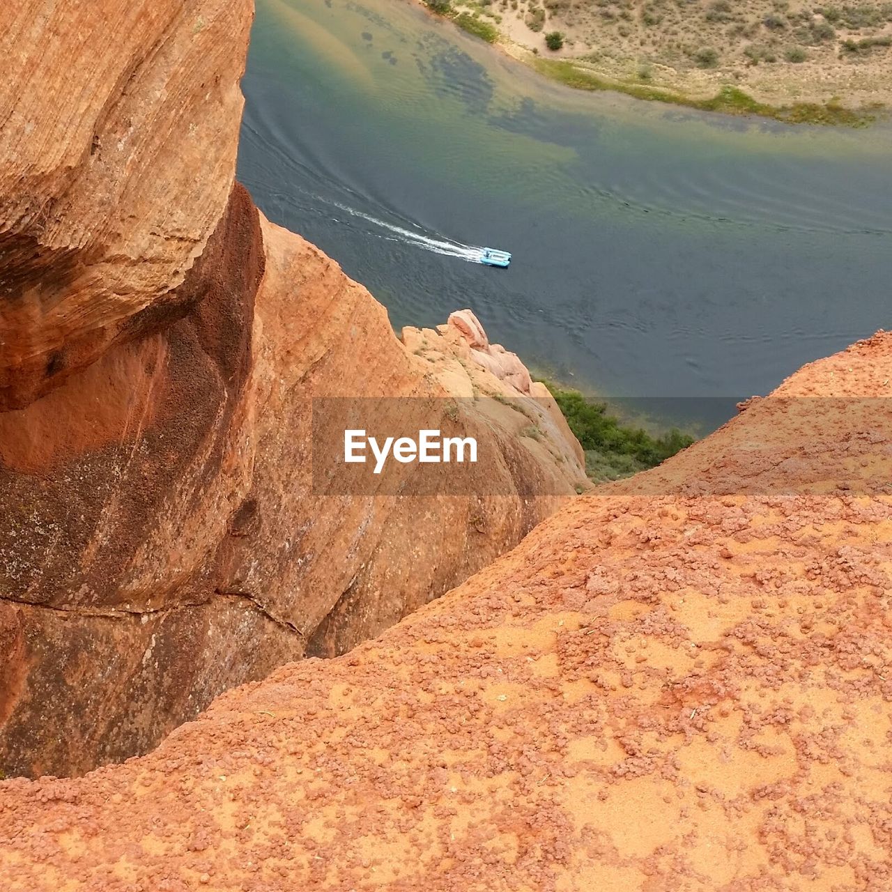 Scenic view of river amidst mountains