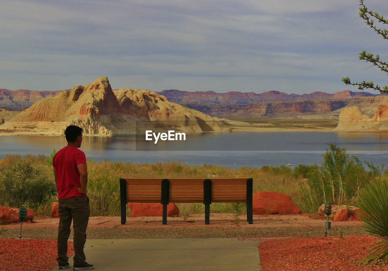 SCENIC VIEW OF LAKE WITH MOUNTAINS IN BACKGROUND