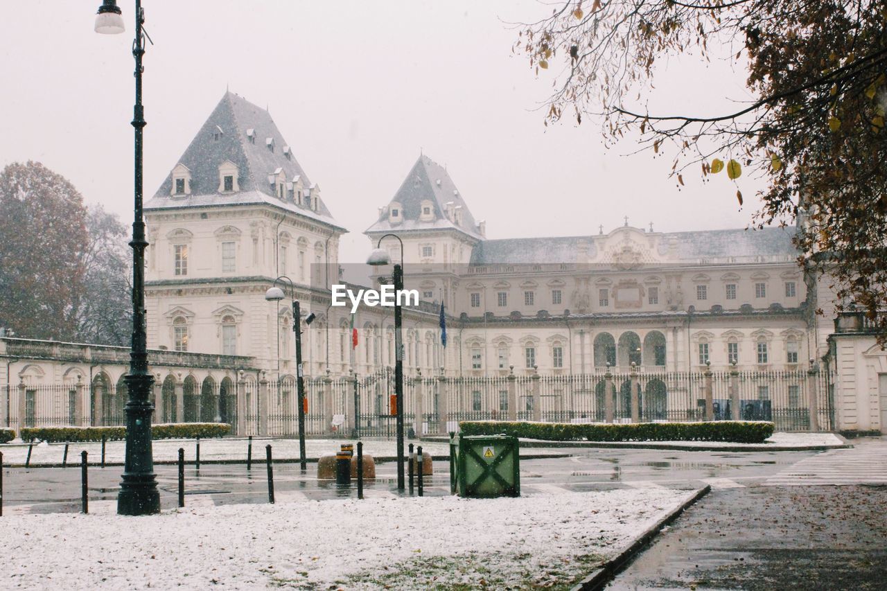 View of buildings in city during winter