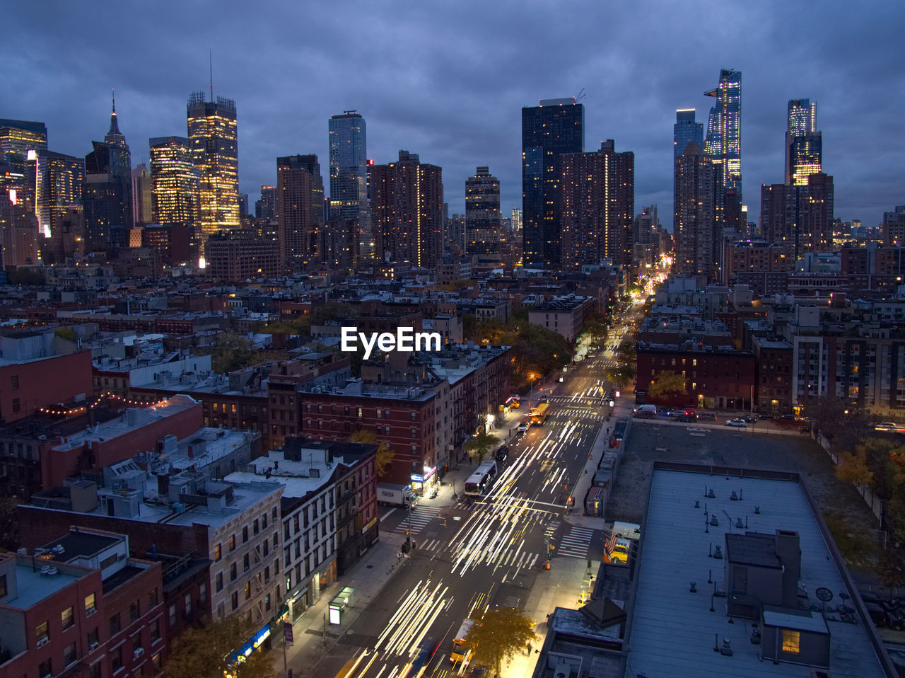 High angle view of illuminated buildings against sky