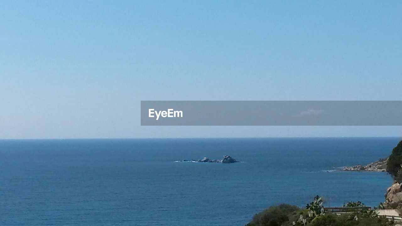 VIEW OF SEA AGAINST CLEAR SKY