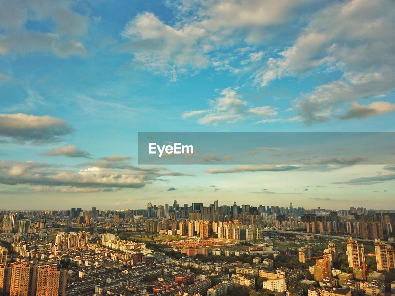 High angle view of buildings in city against sky