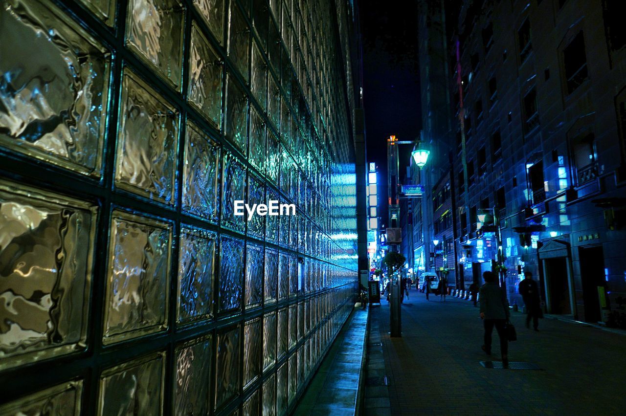 View of glass wall at night