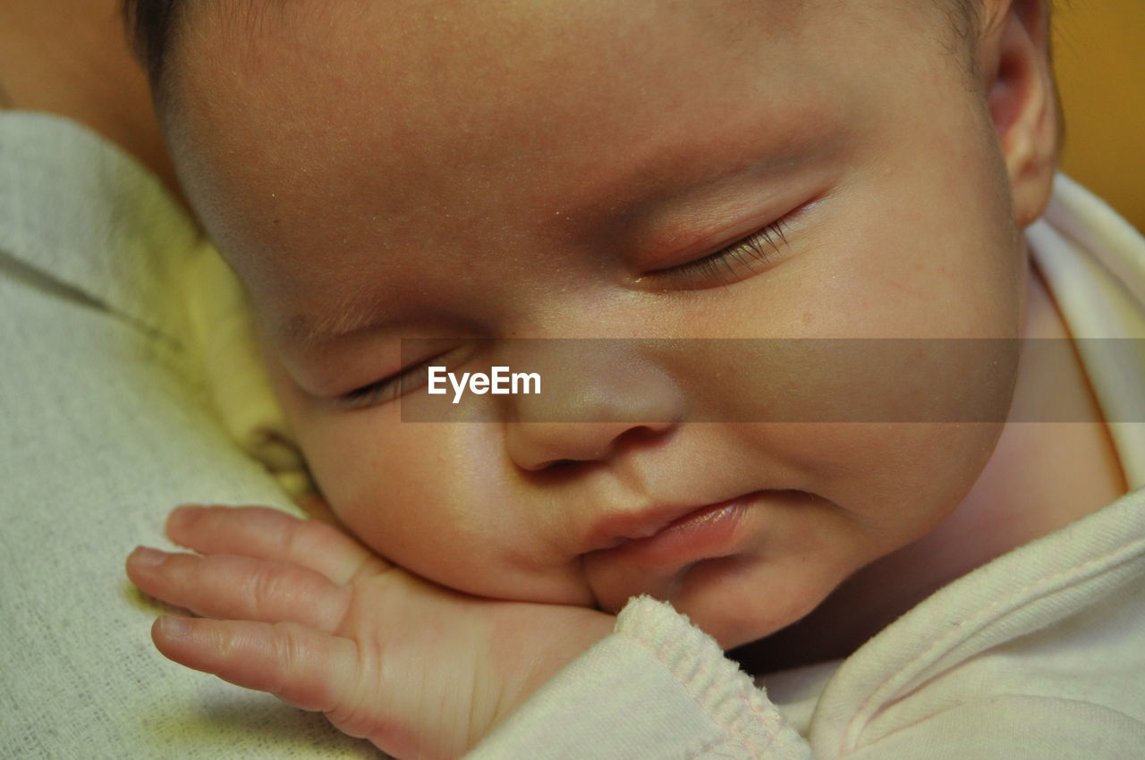 Close-up of baby girl sleeping