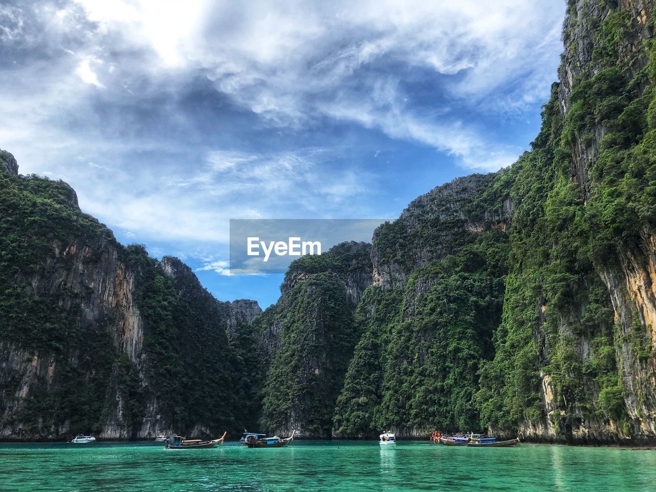 SCENIC VIEW OF SEA AND ROCK FORMATION AGAINST SKY