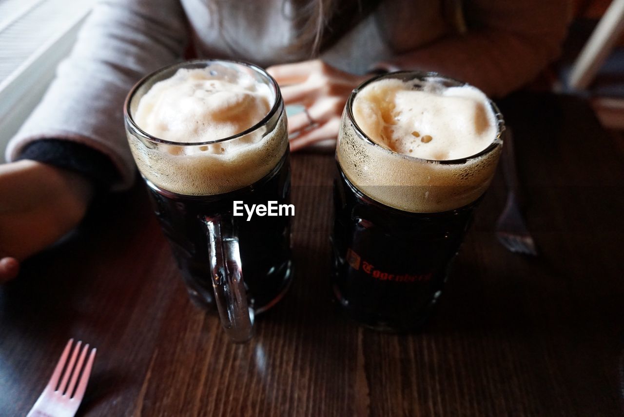 High angle view of beer glass on table