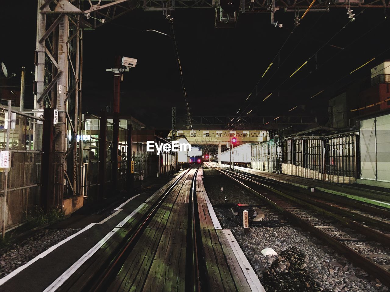 Railroad station platform at night