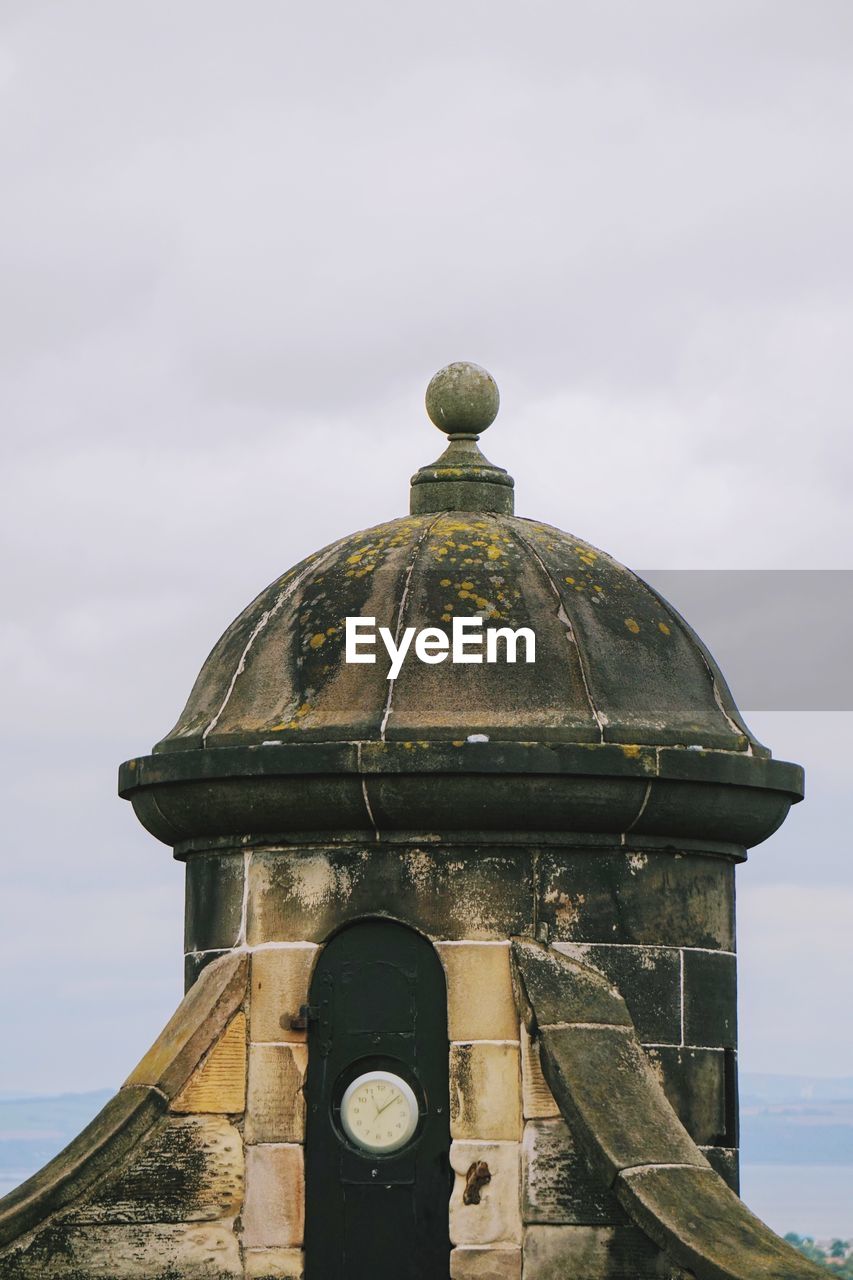 Low angle view of old building against sky