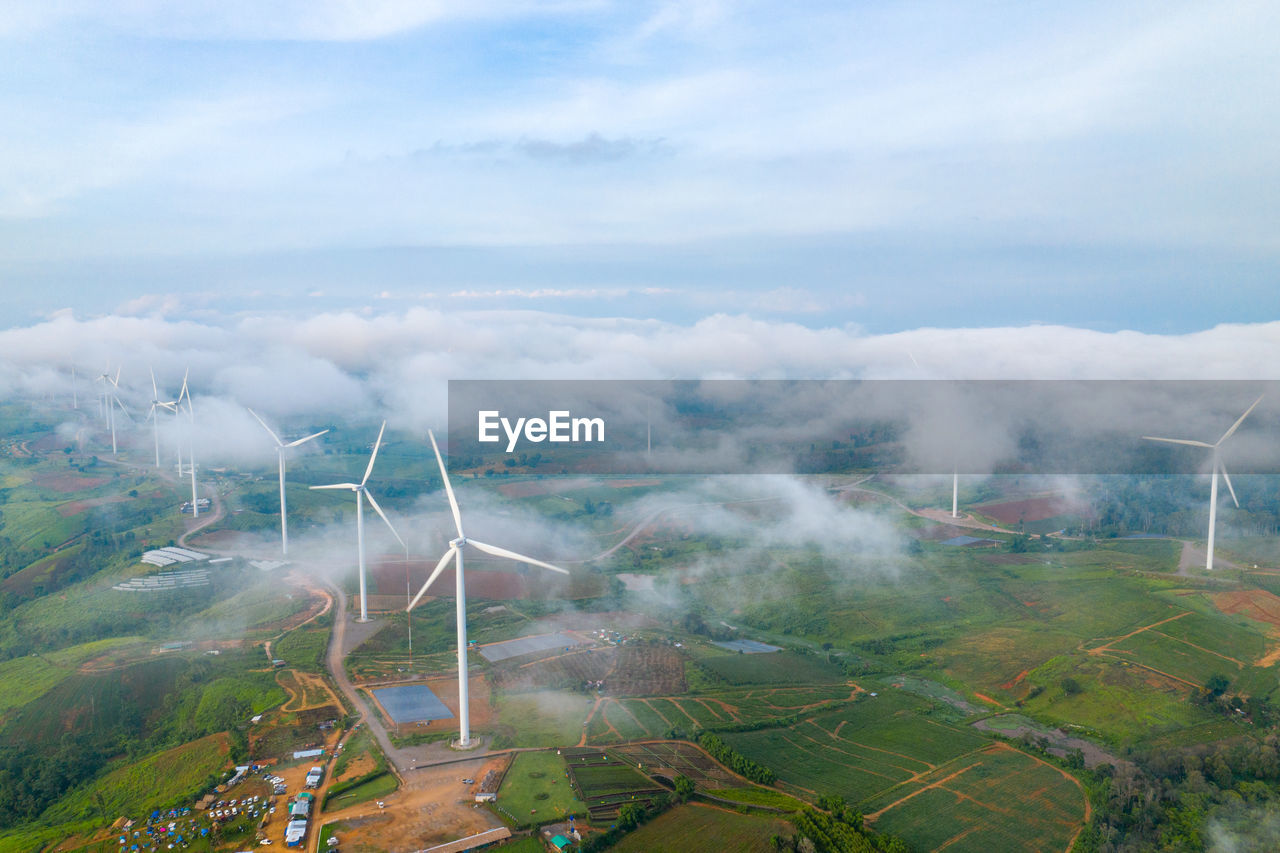 Aerial view of wind farm on field