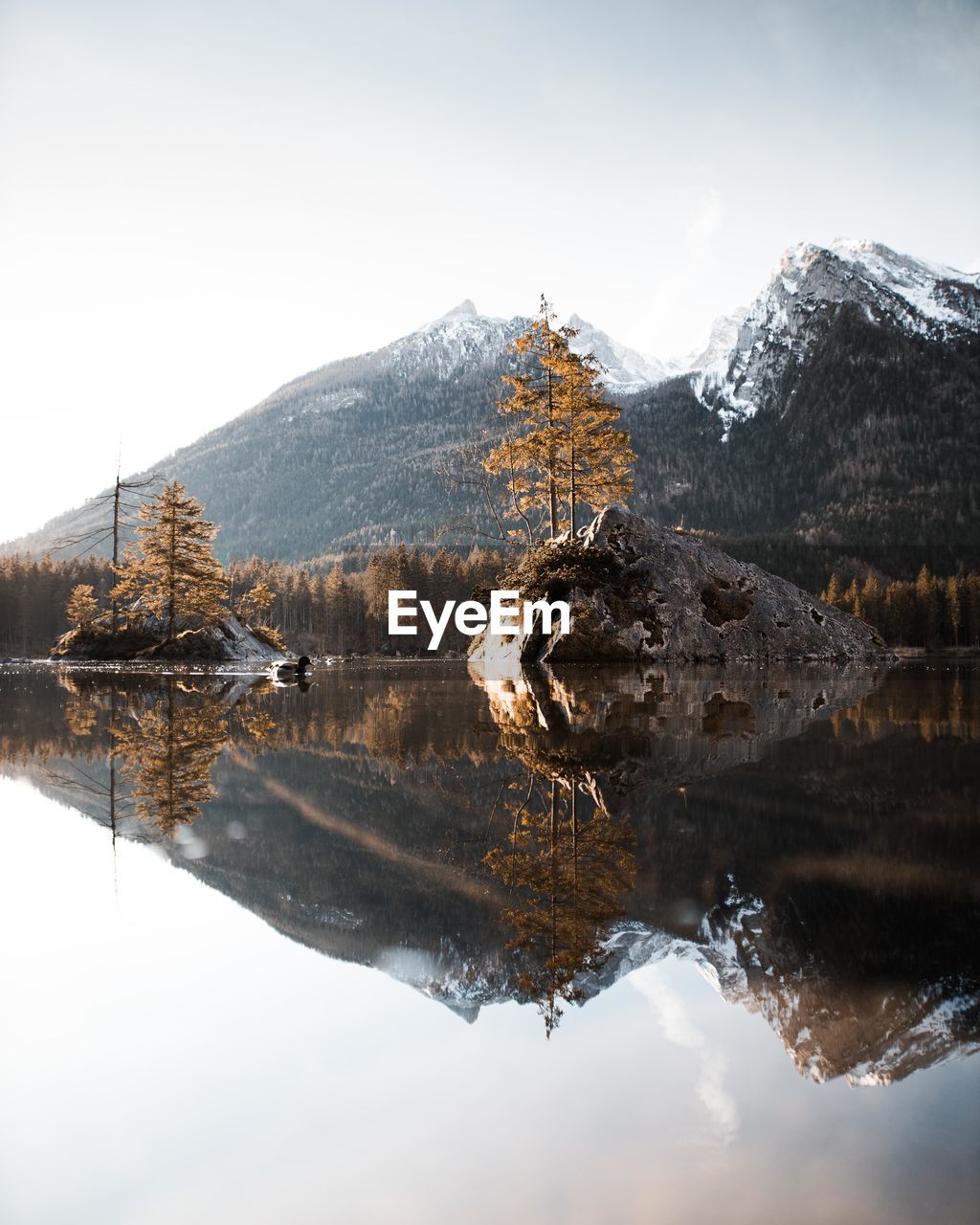 Reflection of mountain in lake against sky