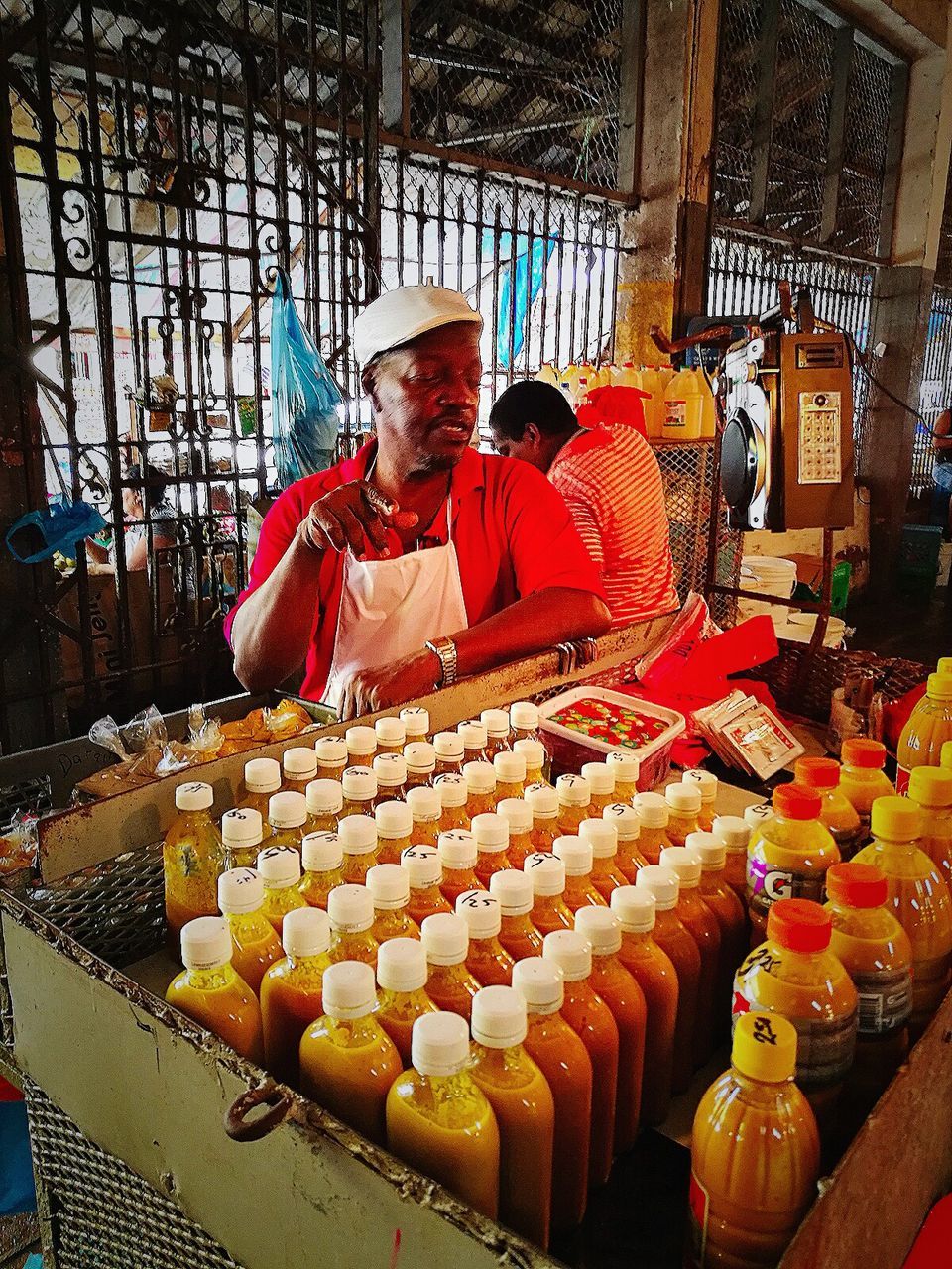 MAN WORKING AT MARKET