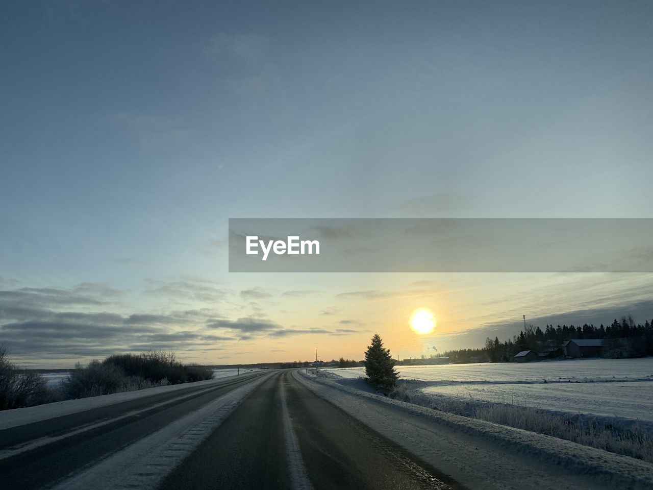 Road against sky during winter