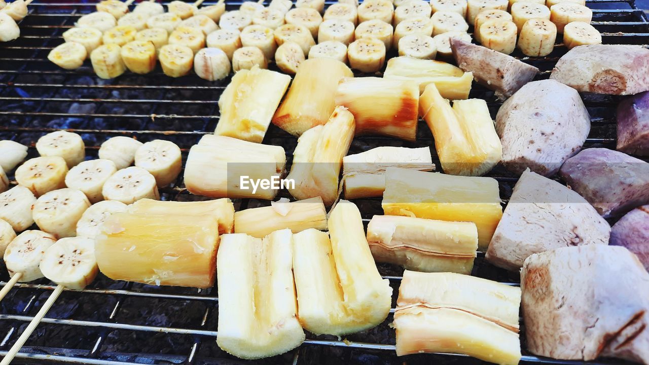 Sweet popato and banana roast on firewood klin., thai street food.