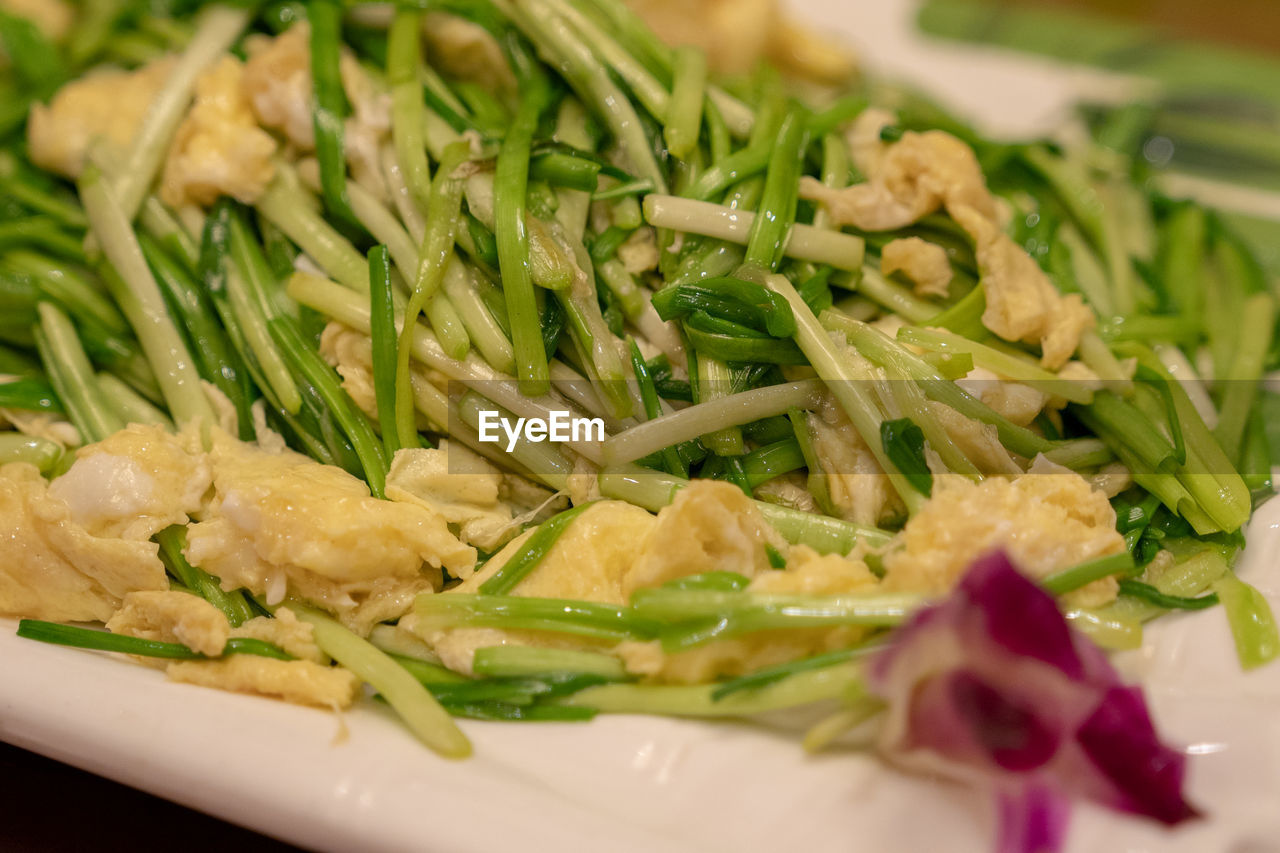 Close-up of chopped vegetables in plate