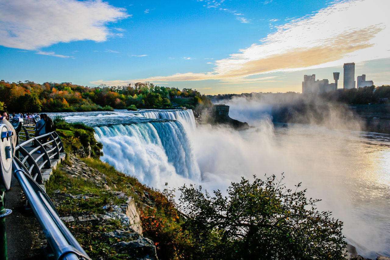 VIEW OF WATERFALL AGAINST SKY