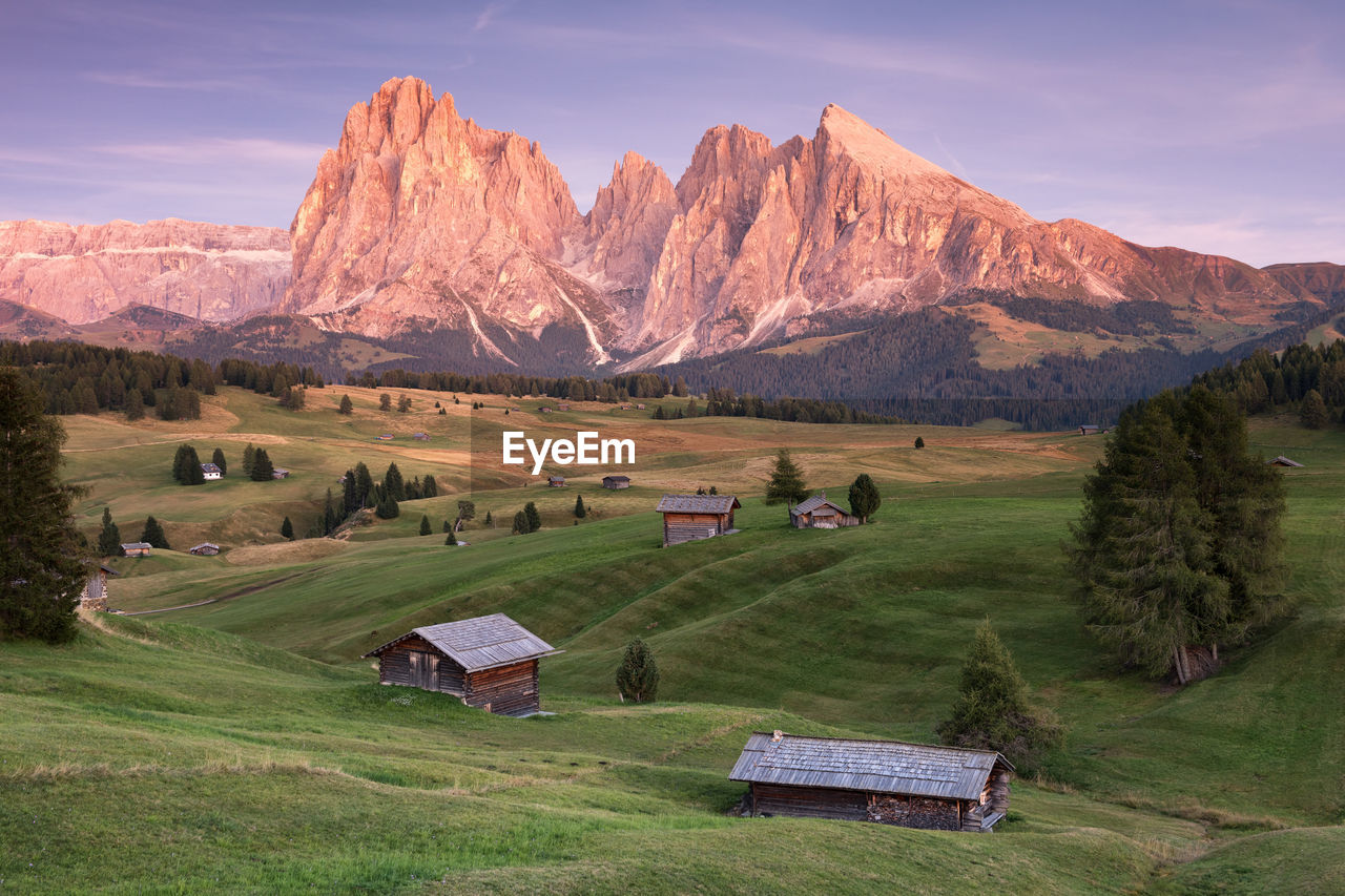 View of landscape and mountains against sky