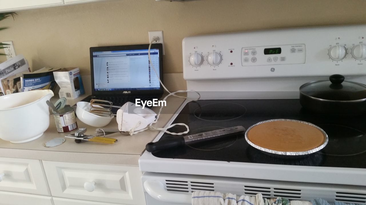 VIEW OF MACHINE IN KITCHEN