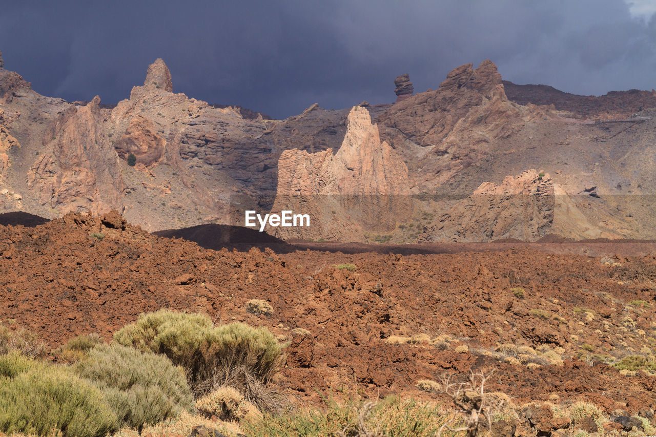 Scenic view of rocky mountains against sky