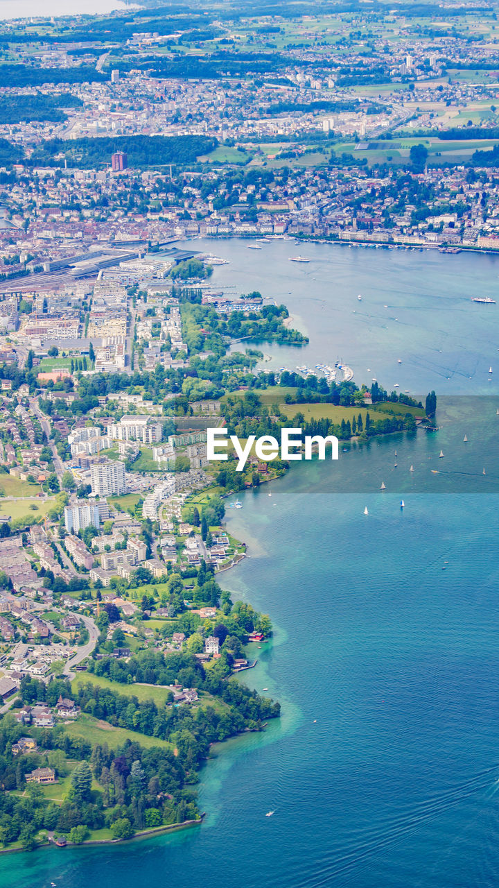 Aerial view of cityscape by river