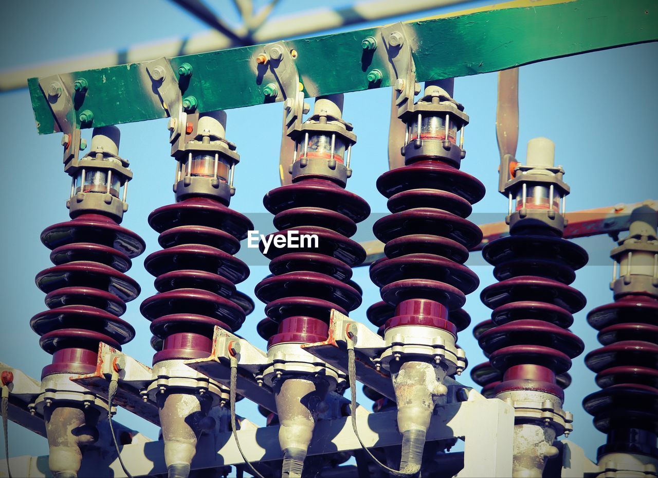 Low angle view of transformers