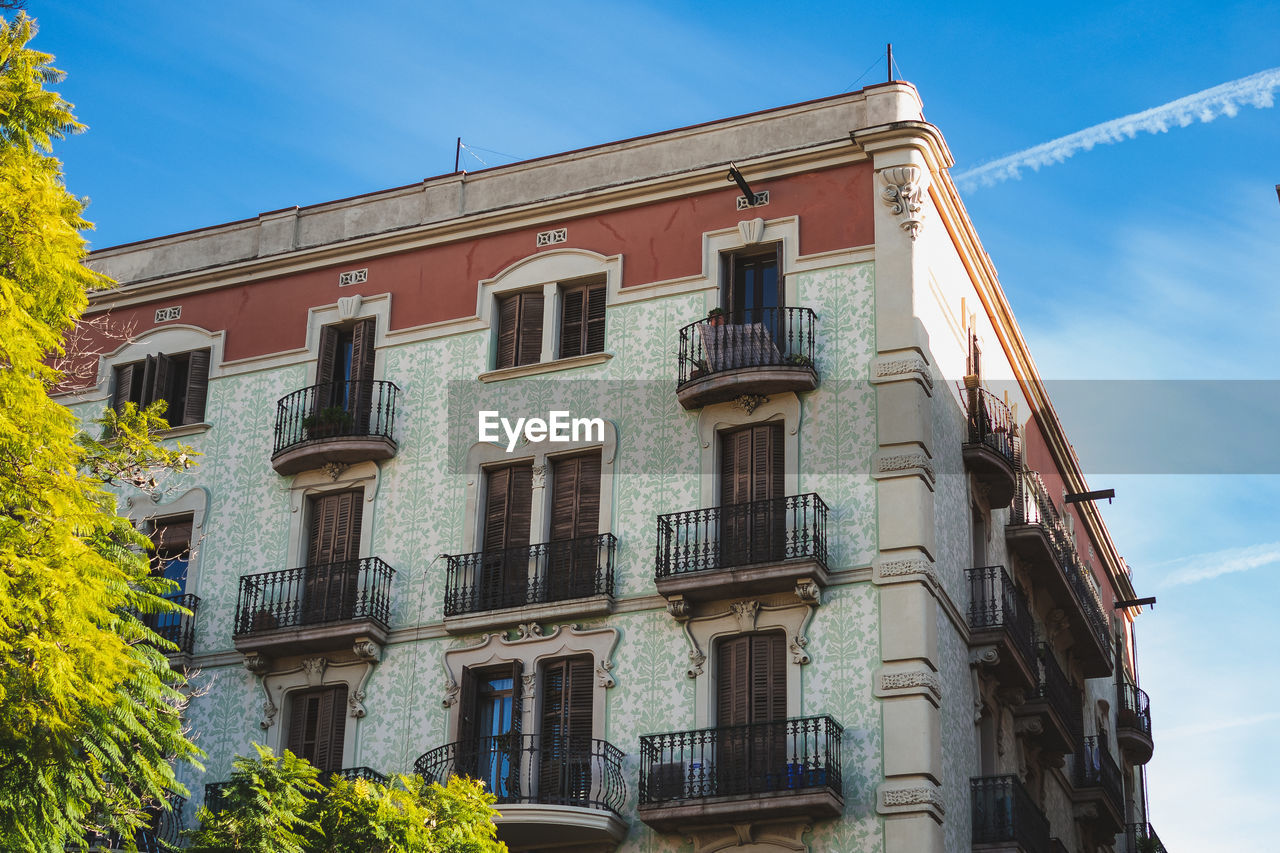 Low angle view of residential building against sky