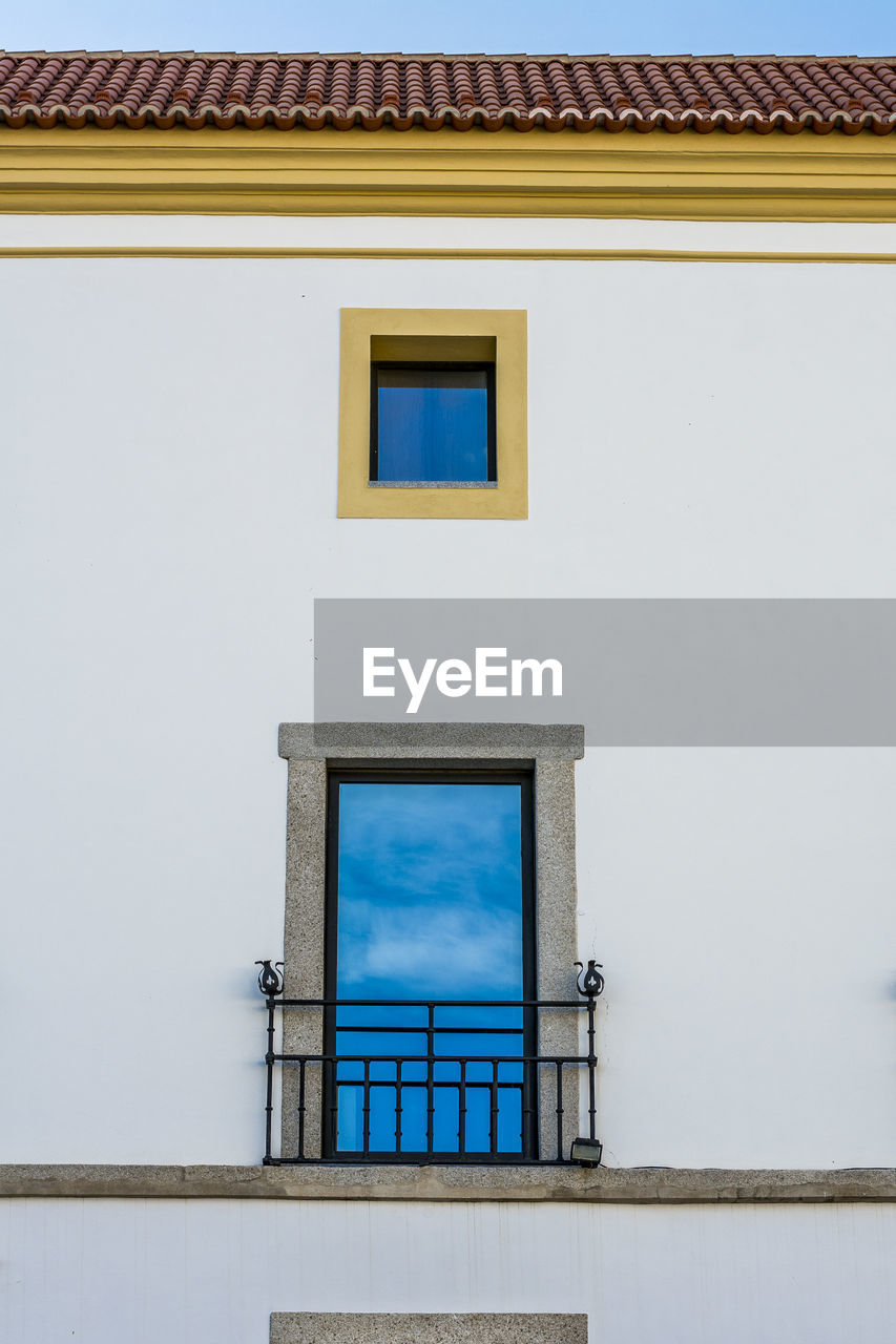 HOUSES AGAINST SKY