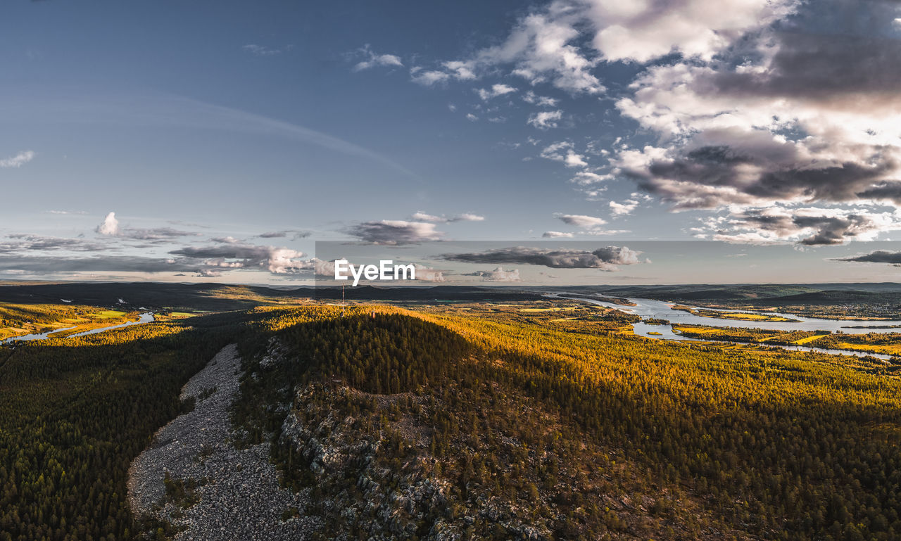 SCENIC VIEW OF LAND AGAINST SKY DURING SUNRISE