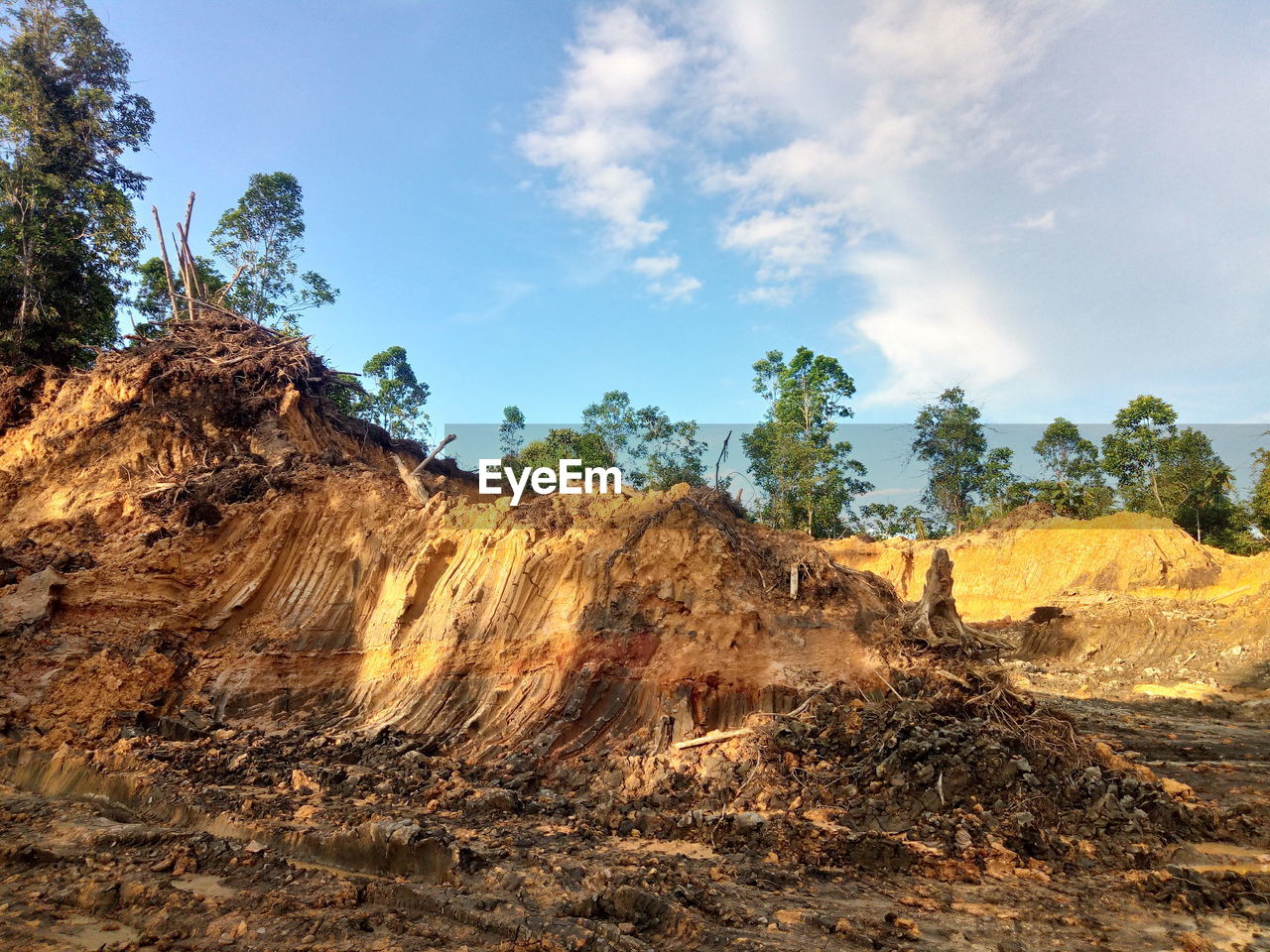 Rock formation on land against sky