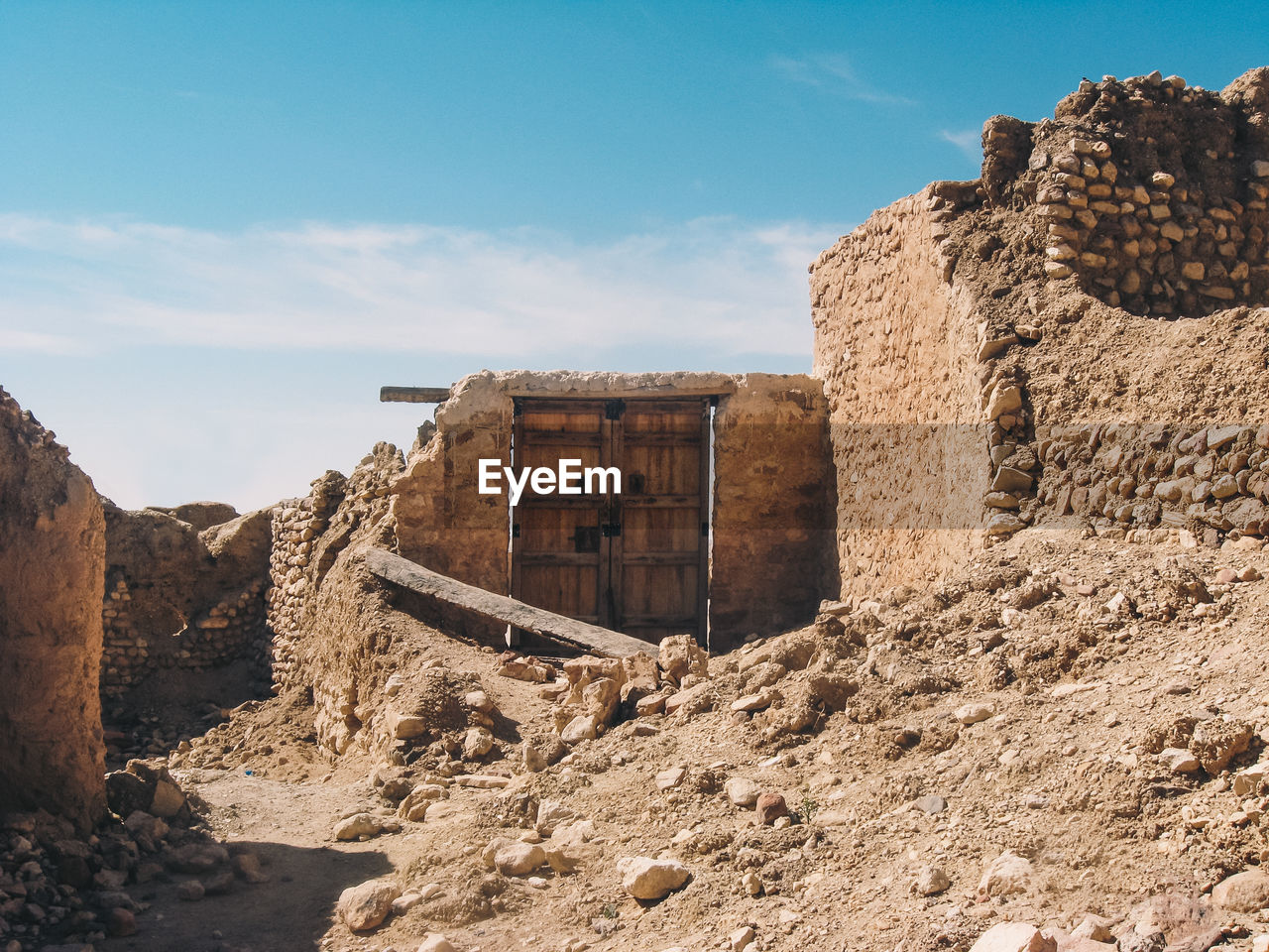 Old ruins of building against sky