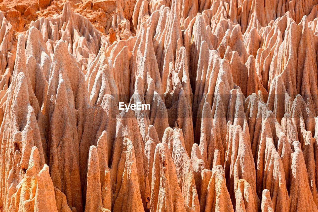 CLOSE-UP OF ROCK IN DESERT