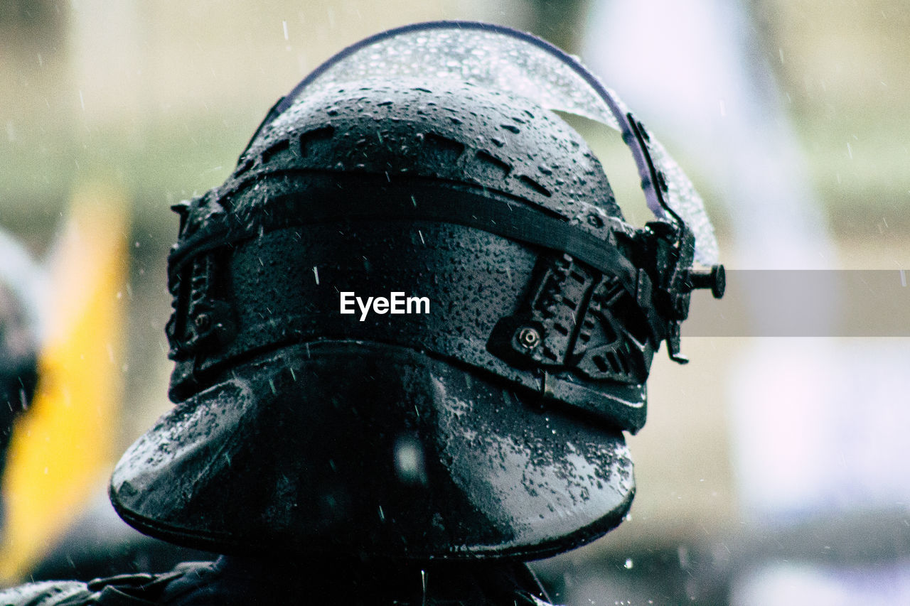 Close-up of helmet in rainy season