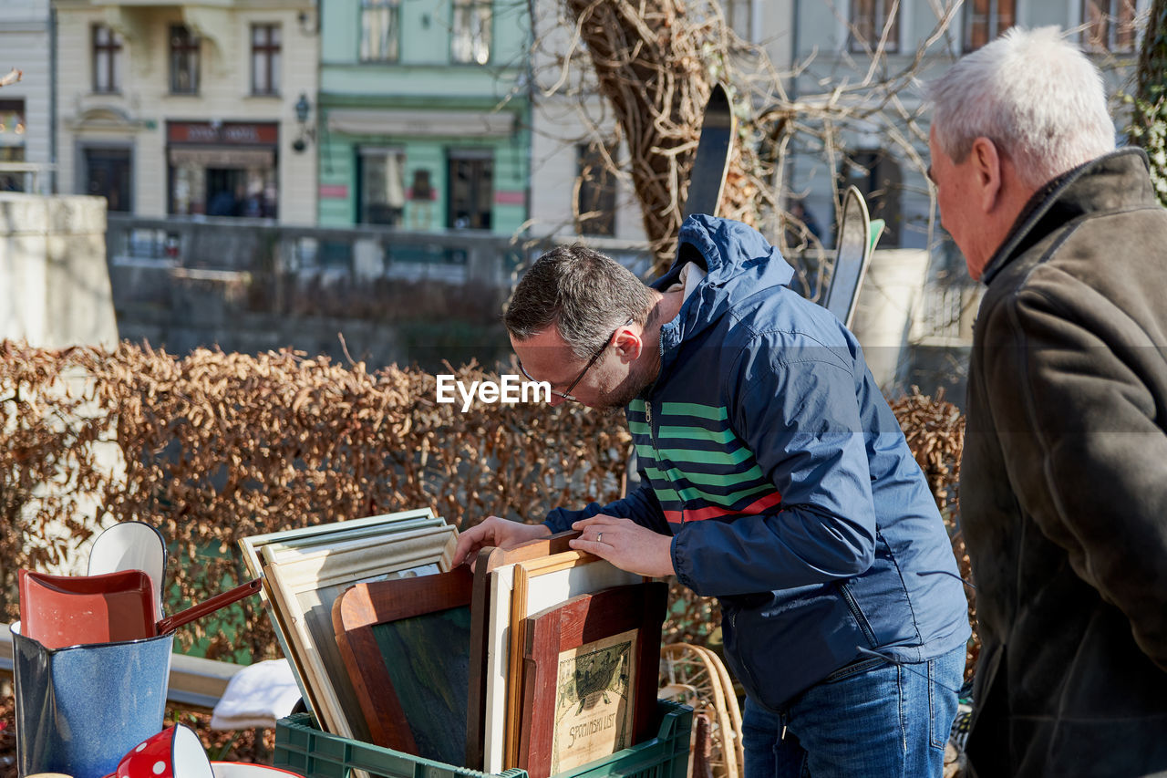 PANORAMIC VIEW OF PEOPLE AT TOWN