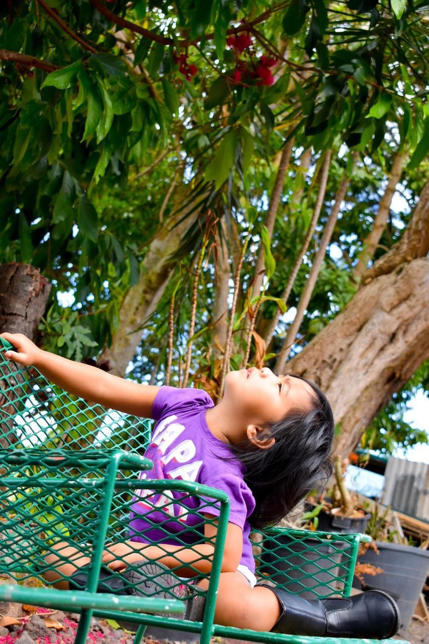 GIRL PLAYING AT PARK