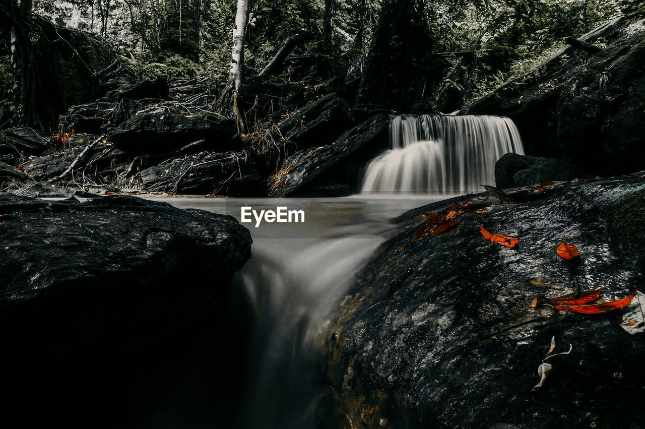 WATER SPLASHING ON ROCKS