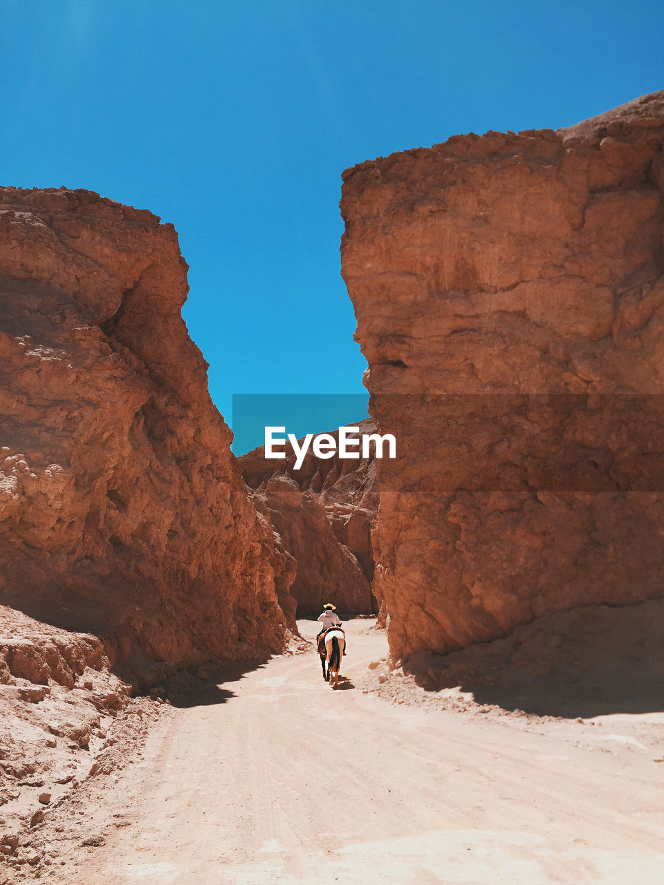 Man sitting on rock formation