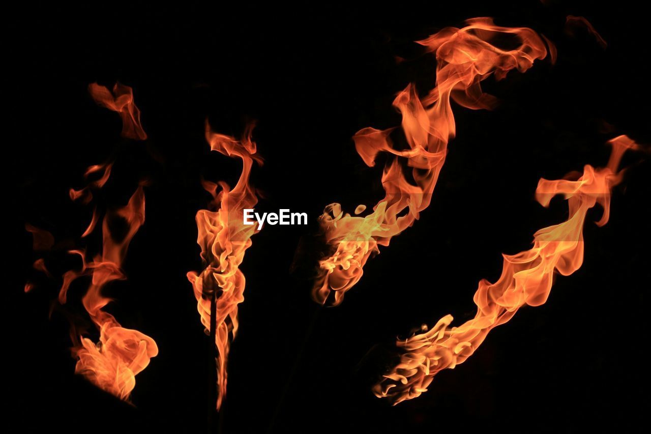 CLOSE-UP OF BONFIRE DURING NIGHT