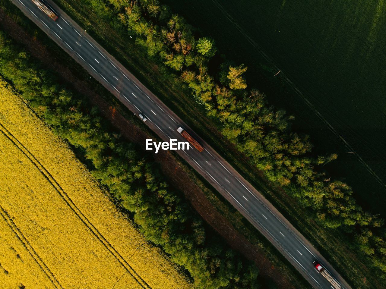 Directly above shot of road by landscape in city