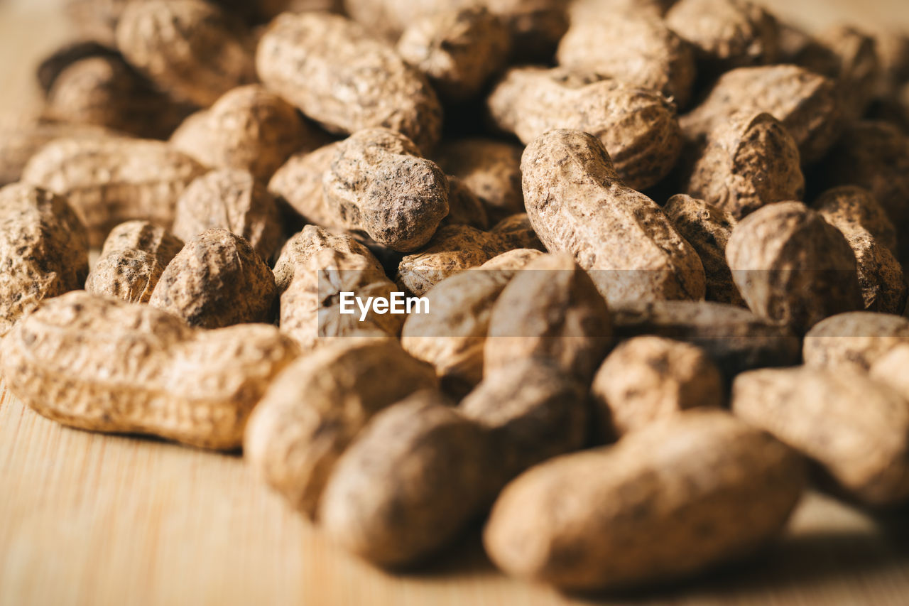 Peanuts on a wooden background