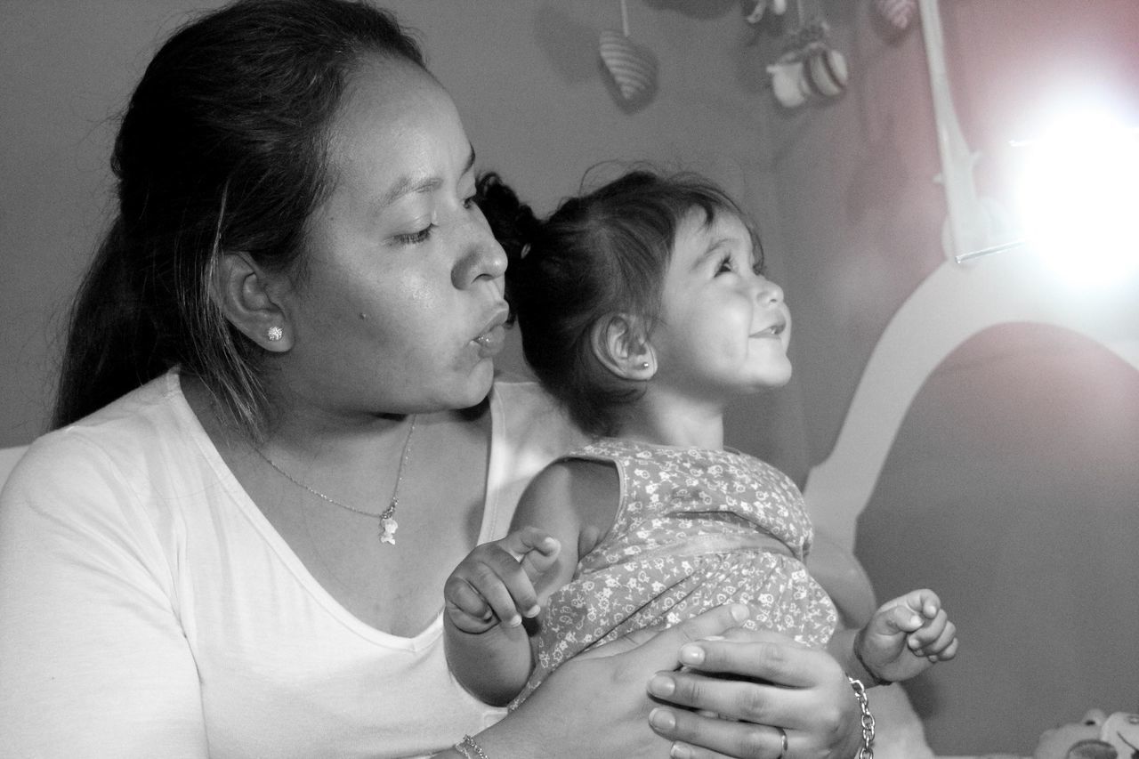 Mother with daughter at home