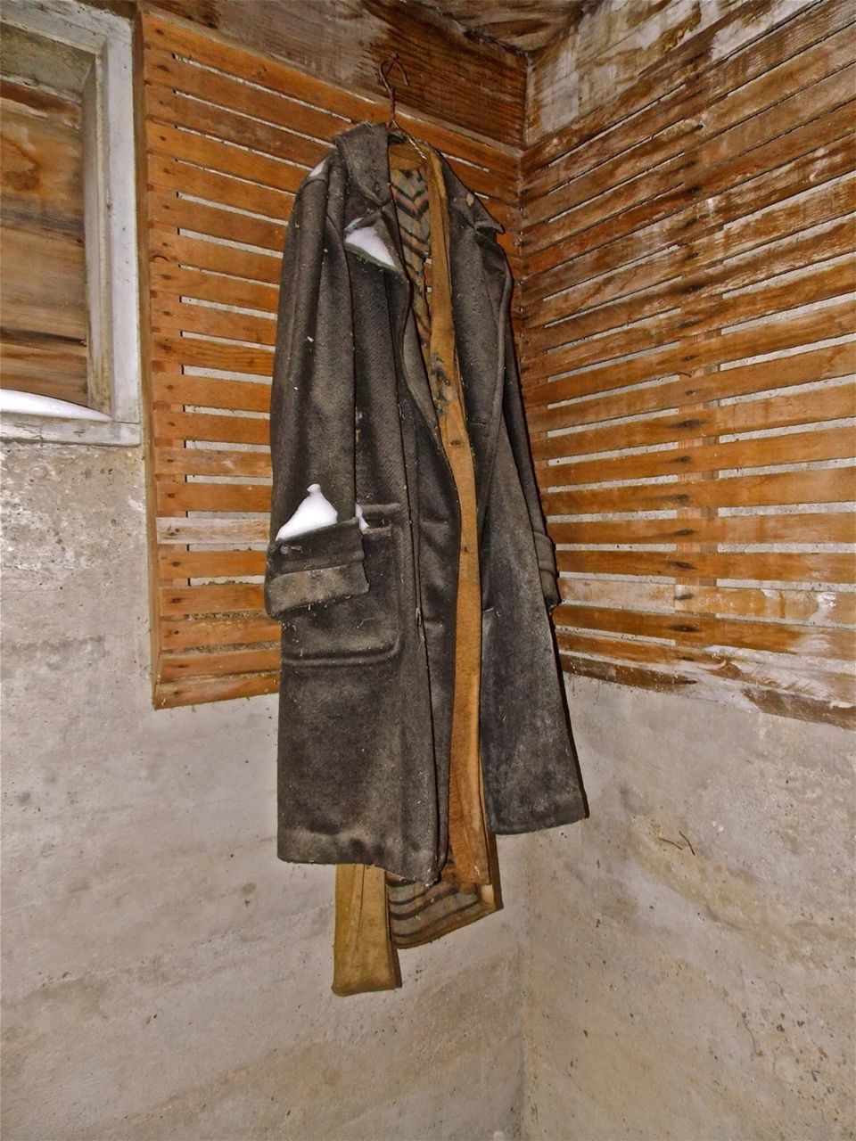 Coat hanging on wall