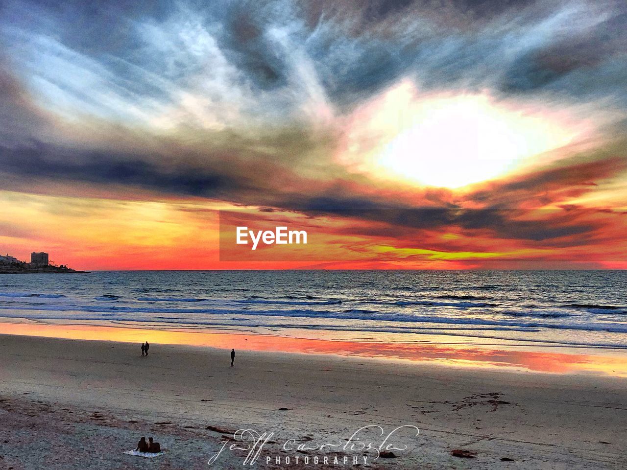 SCENIC VIEW OF BEACH DURING SUNSET