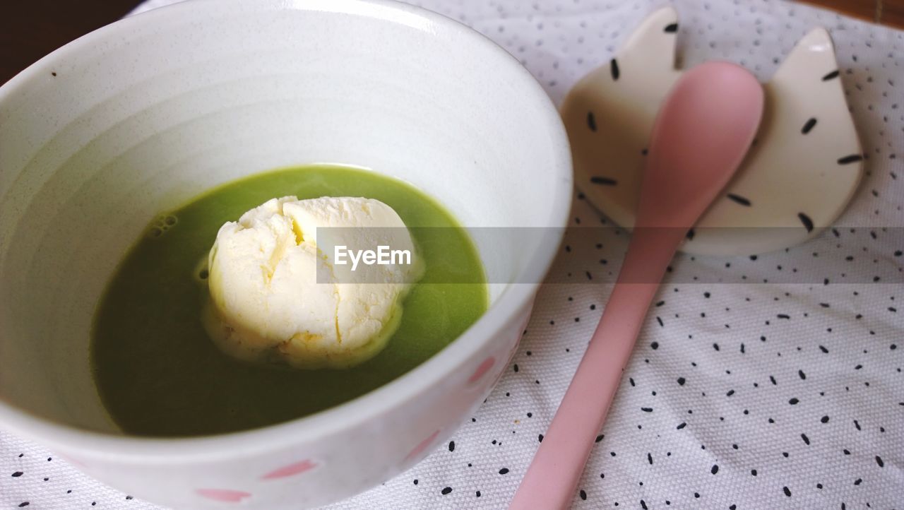 High angle view of matcha affogato served in bowl on table