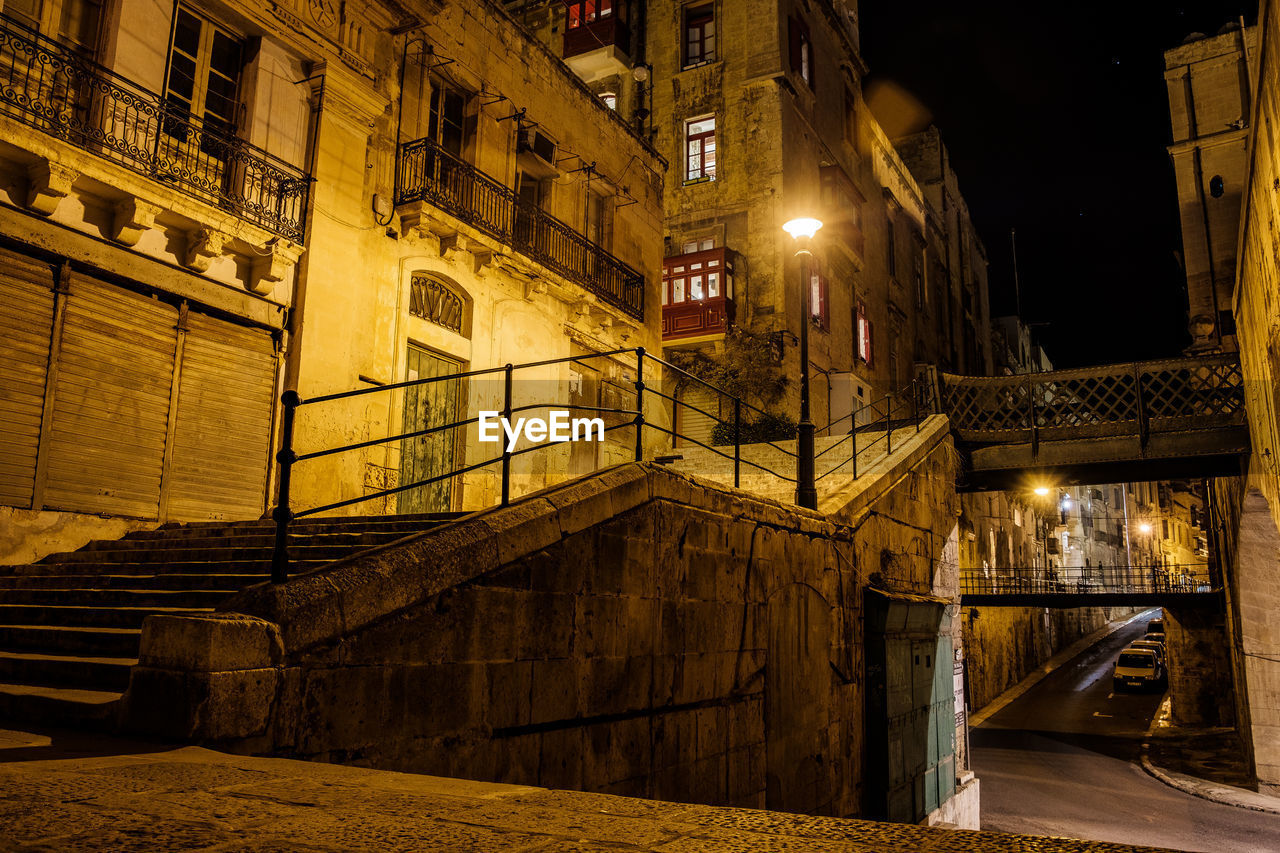 ILLUMINATED STREET LIGHT BY BUILDING