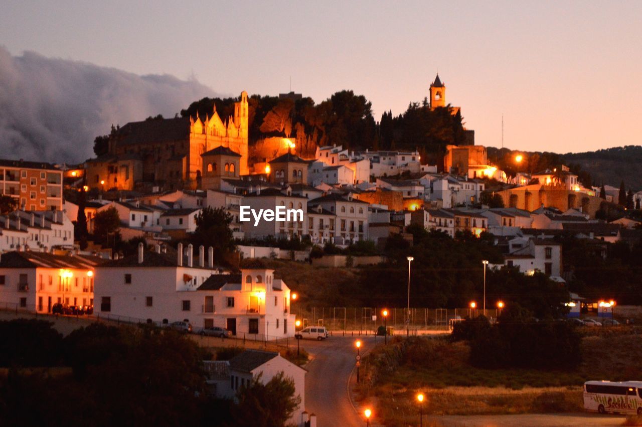 ILLUMINATED CITY AT NIGHT