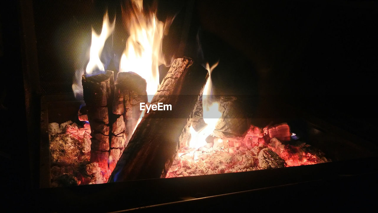 CLOSE-UP OF BONFIRE IN FIRE