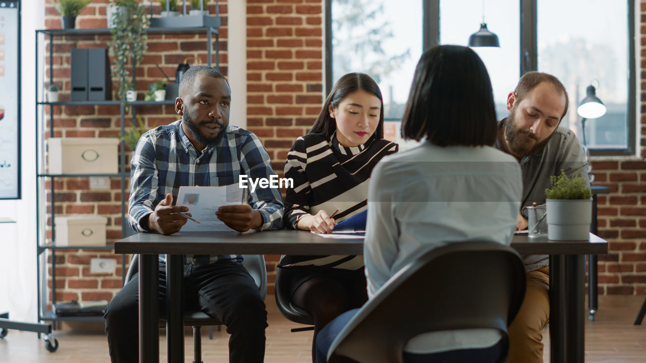 Recruiter interviewing candidate at office